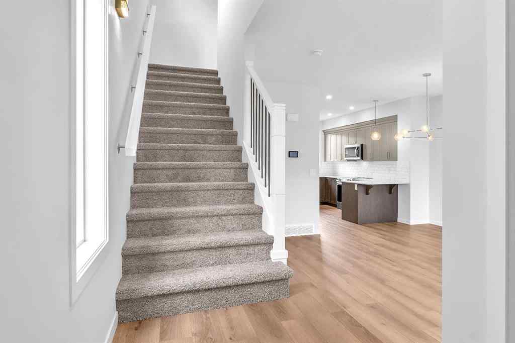 MLS® A2241305 - 70 Creekside Manor SW in Pine Creek Calgary, Residential