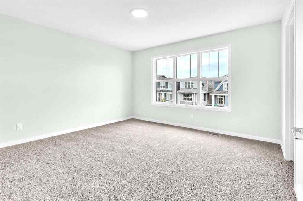MLS® A2241305 - 70 Creekside Manor SW in Pine Creek Calgary, Residential