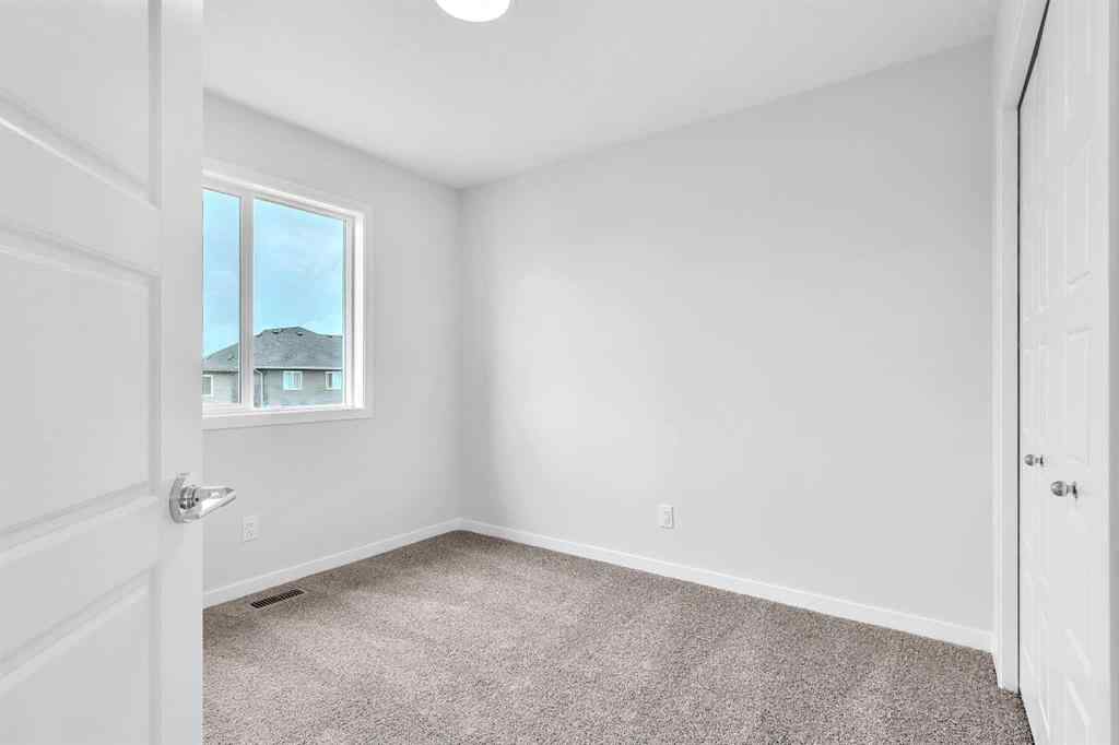 MLS® A2241305 - 70 Creekside Manor SW in Pine Creek Calgary, Residential