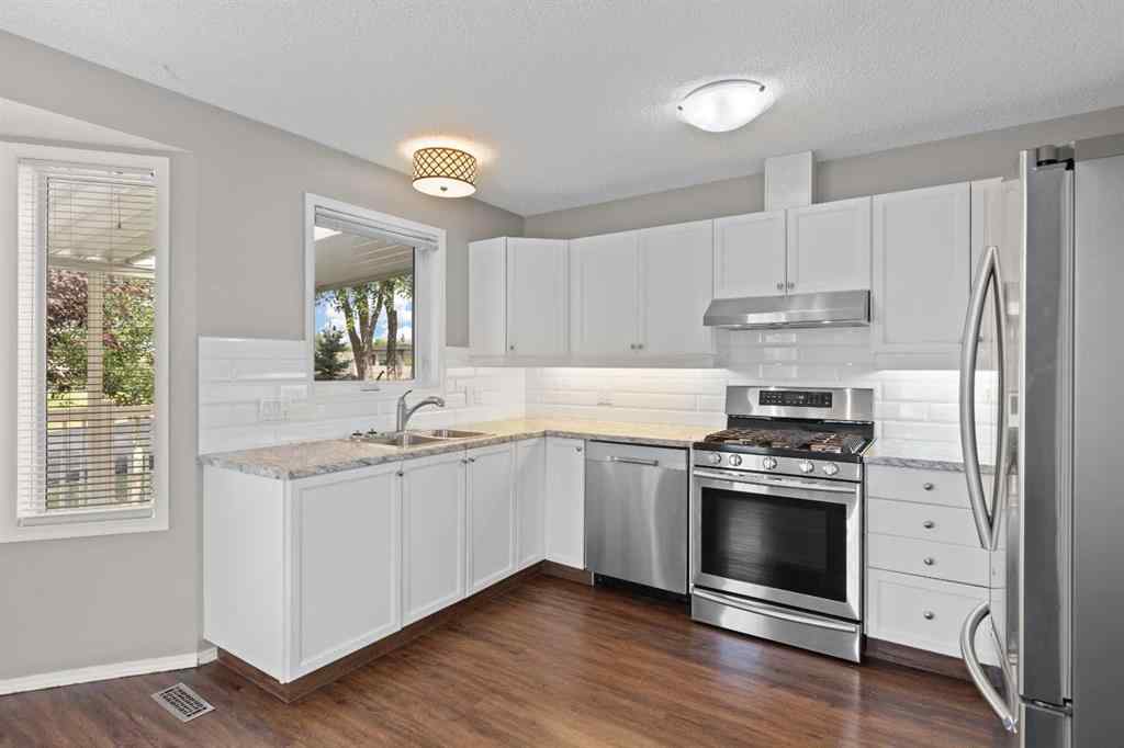 MLS® A2241310 - 817 Riverside Drive NW in High River Golf Course High River, Residential