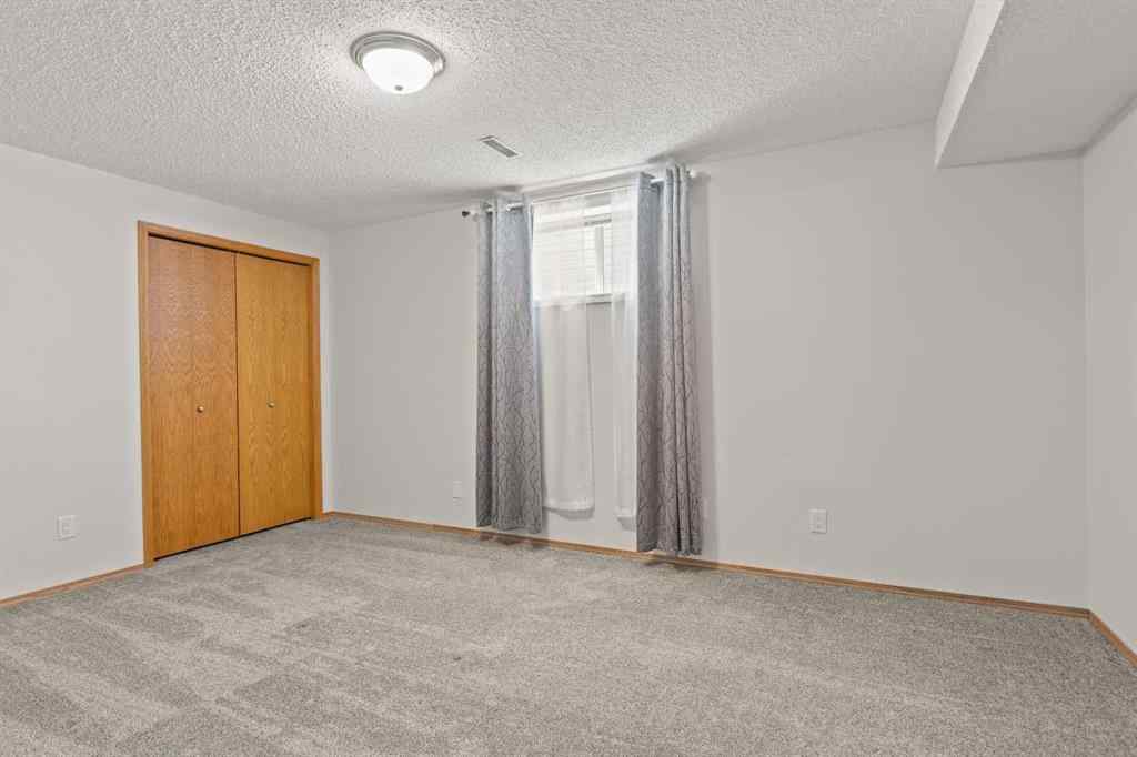 MLS® A2241310 - 817 Riverside Drive NW in High River Golf Course High River, Residential