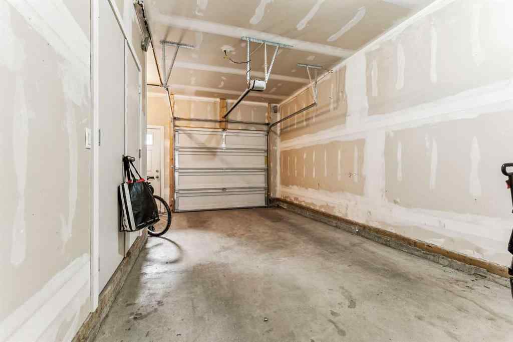MLS® A2241328 - Unit #113 2802 Kings Heights Gate SE in Ravenswood Airdrie, Residential