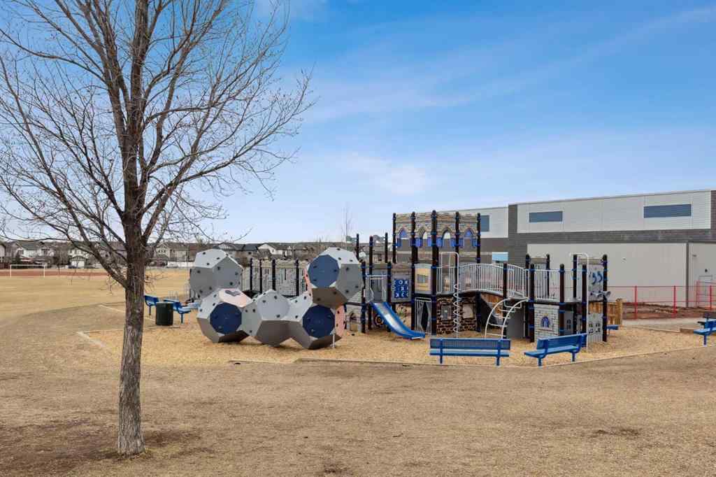 MLS® A2241328 - Unit #113 2802 Kings Heights Gate SE in Ravenswood Airdrie, Residential