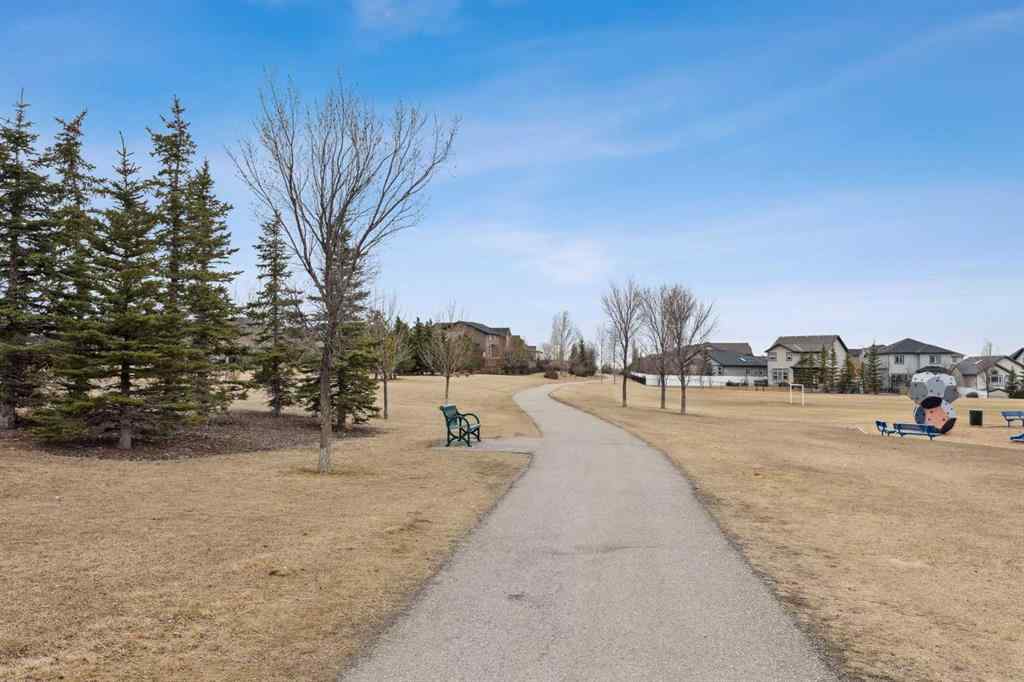 MLS® A2241328 - Unit #113 2802 Kings Heights Gate SE in Ravenswood Airdrie, Residential