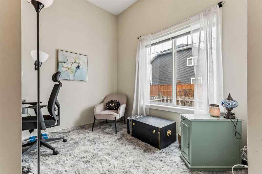 MLS® A2241328 - Unit #113 2802 Kings Heights Gate SE in Ravenswood Airdrie, Residential