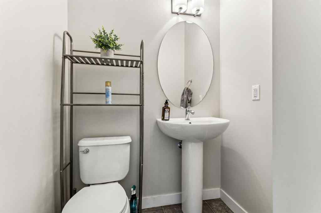 MLS® A2241328 - Unit #113 2802 Kings Heights Gate SE in Ravenswood Airdrie, Residential