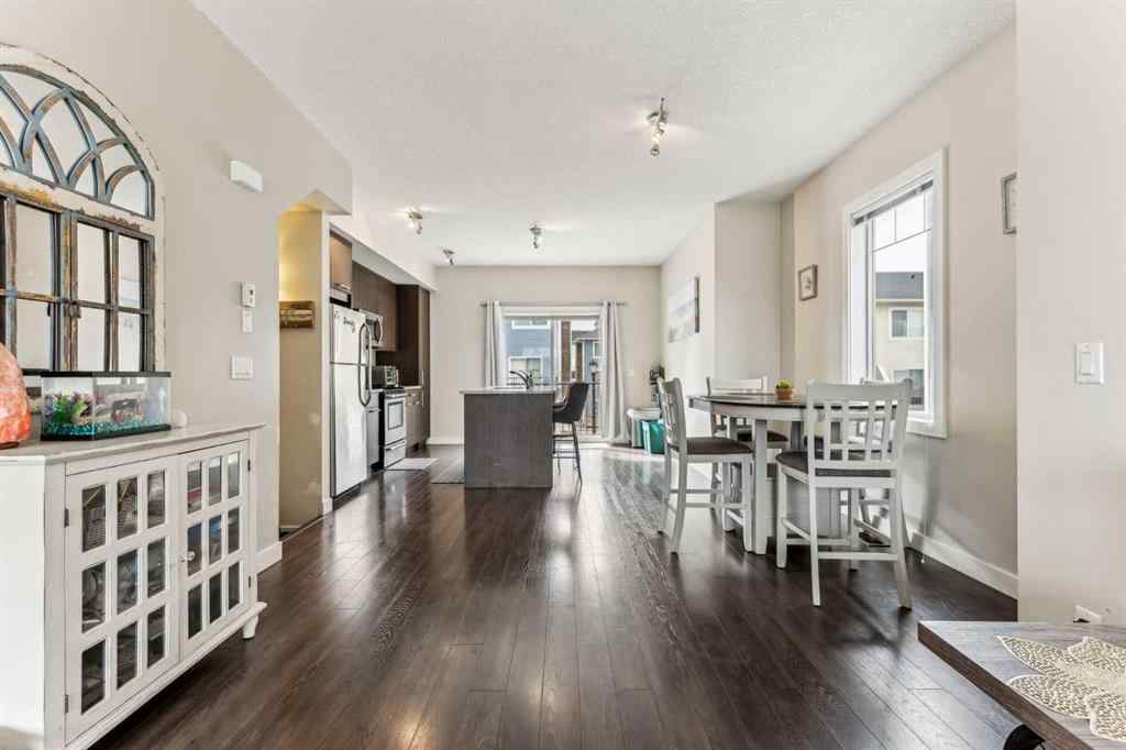 MLS® A2241328 - Unit #113 2802 Kings Heights Gate SE in Ravenswood Airdrie, Residential