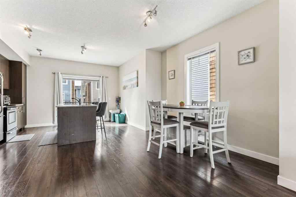 MLS® A2241328 - Unit #113 2802 Kings Heights Gate SE in Ravenswood Airdrie, Residential
