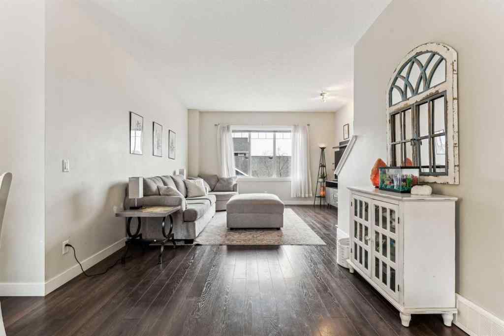 MLS® A2241328 - Unit #113 2802 Kings Heights Gate SE in Ravenswood Airdrie, Residential
