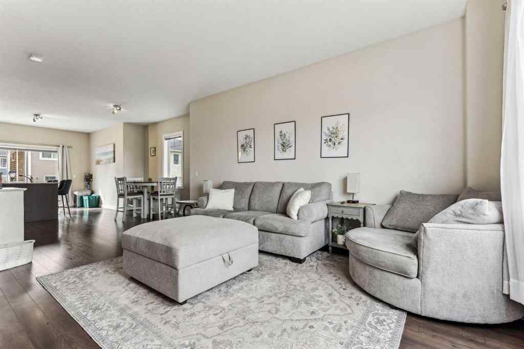 MLS® A2241328 - Unit #113 2802 Kings Heights Gate SE in Ravenswood Airdrie, Residential