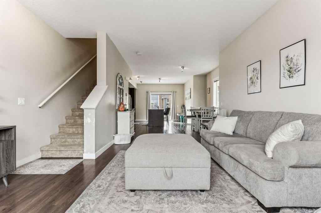 MLS® A2241328 - Unit #113 2802 Kings Heights Gate SE in Ravenswood Airdrie, Residential
