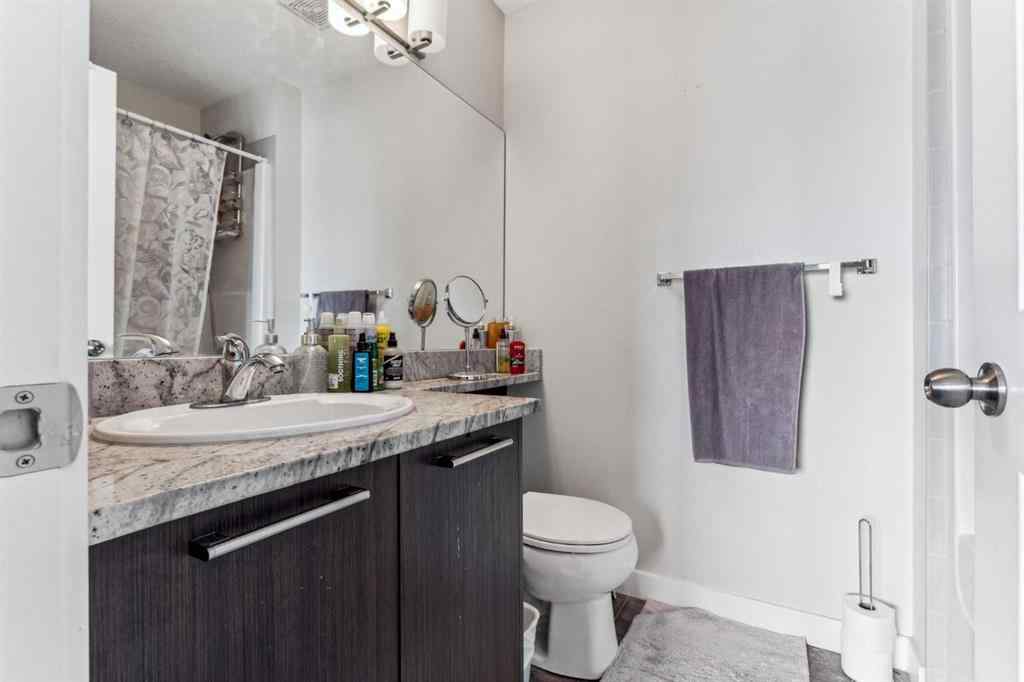 MLS® A2241328 - Unit #113 2802 Kings Heights Gate SE in Ravenswood Airdrie, Residential