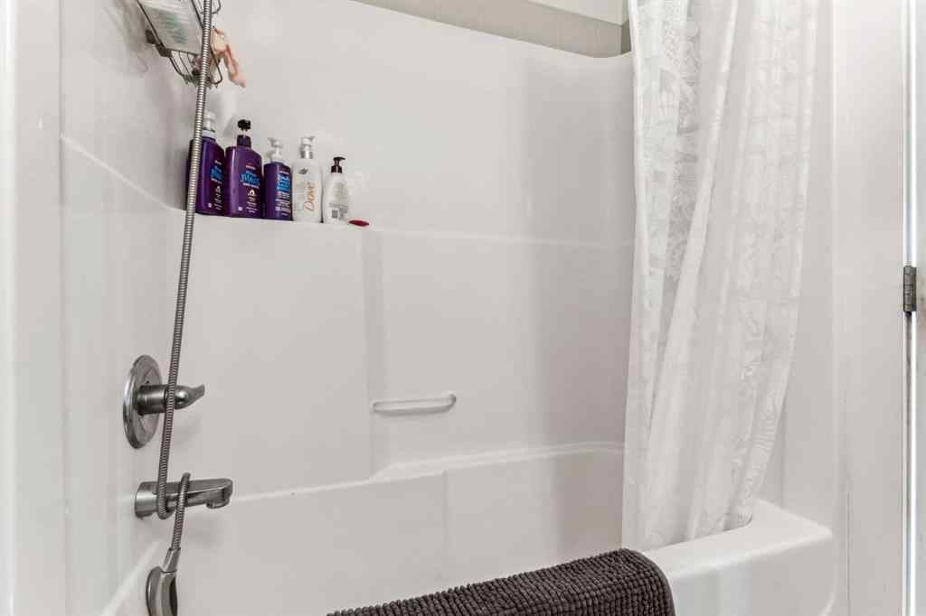 MLS® A2241328 - Unit #113 2802 Kings Heights Gate SE in Ravenswood Airdrie, Residential