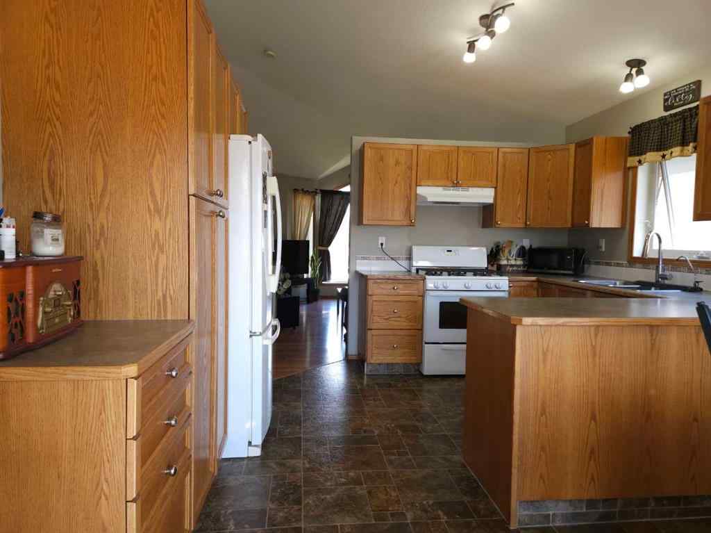 MLS® A2241368 - 114 Robinson Avenue  in Park Place Penhold, Residential