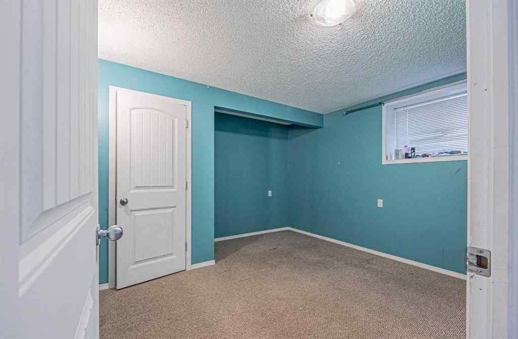 MLS® A2241373 - 121 Saddlecrest Green NE in Saddle Ridge Calgary, Residential