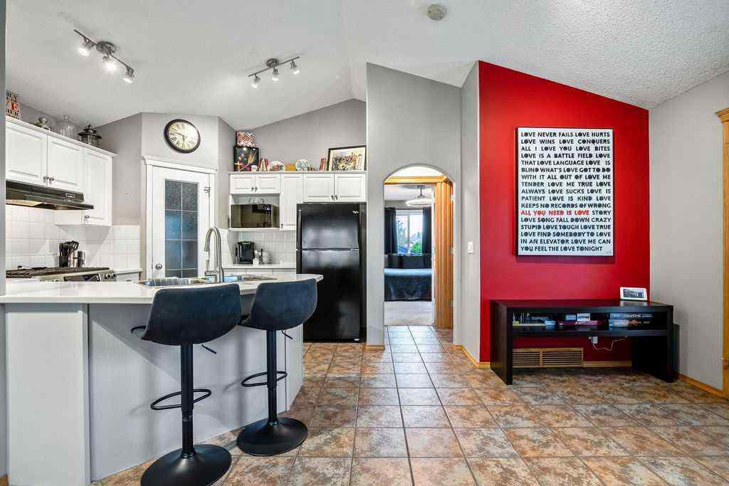 MLS® A2241389 - 128 Cramond Crescent SE in Cranston Calgary, Residential