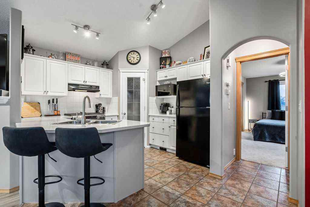 MLS® A2241389 - 128 Cramond Crescent SE in Cranston Calgary, Residential