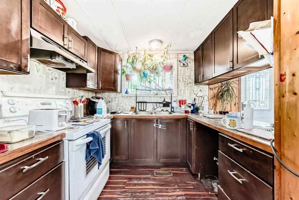 MLS® A2241455 - 28 Riley Street NE in Central High River High River, Residential