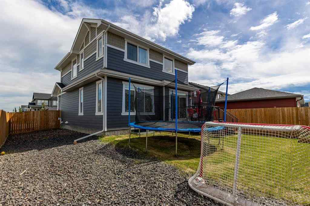 MLS® A2241475 - 79 Sunrise Way  in Sunset Ridge Cochrane, Residential
