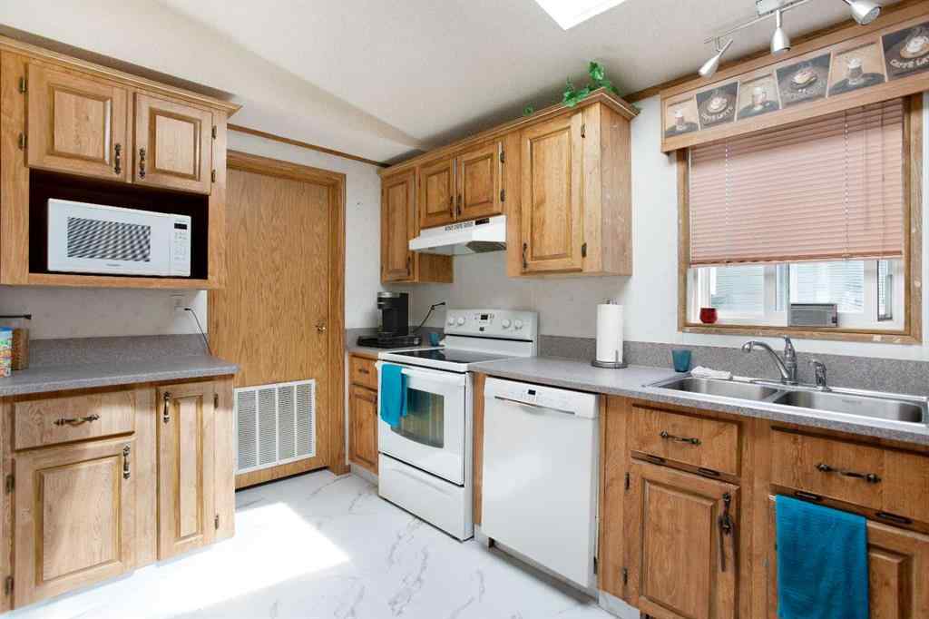 MLS® A2241500 - Unit #62 99 Arbour Lake Road NW in Arbour Lake Calgary, Mobile