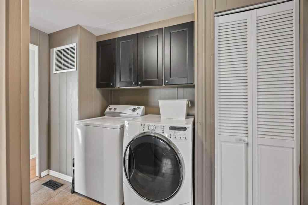 MLS® A2241515 - 828 West Chestermere Drive  in West Chestermere Drive Chestermere, Mobile