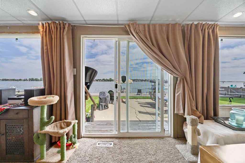 MLS® A2241515 - 828 West Chestermere Drive  in West Chestermere Drive Chestermere, Mobile