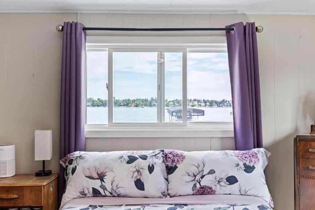 MLS® A2241515 - 828 West Chestermere Drive  in West Chestermere Drive Chestermere, Mobile
