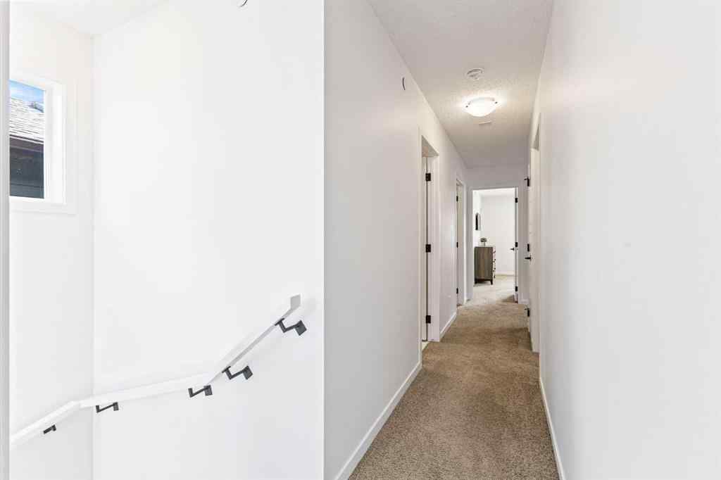 MLS® A2241603 - 179 Livingston Avenue NE in Livingston Calgary, Residential