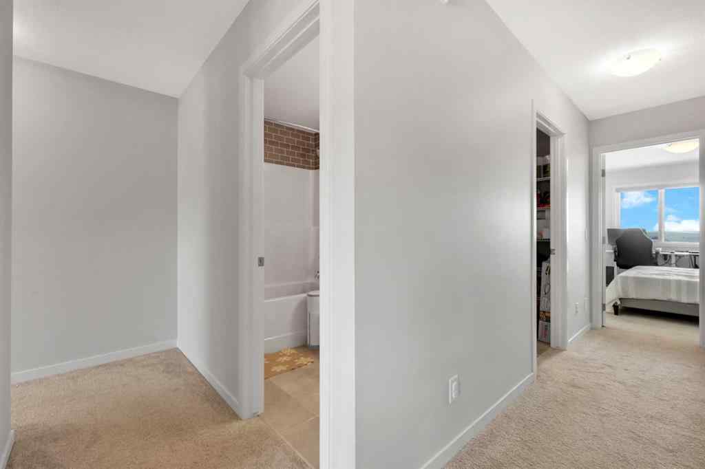 MLS® A2241667 - 222 AQUILA Drive NW in Glacier Ridge Calgary, Residential