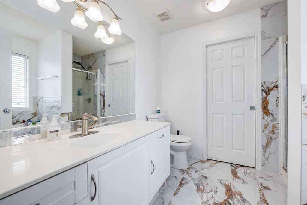 MLS® A2241696 - 61 Saddlecrest Place NE in Saddle Ridge Calgary, Residential