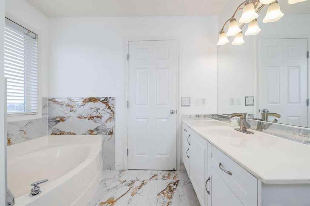 MLS® A2241696 - 61 Saddlecrest Place NE in Saddle Ridge Calgary, Residential