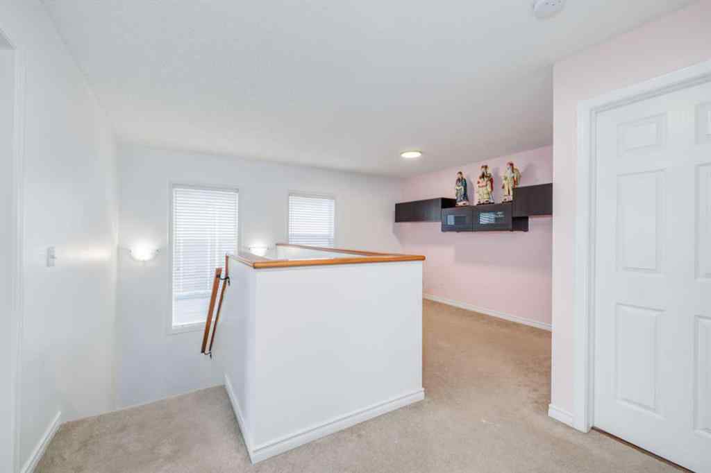MLS® A2241696 - 61 Saddlecrest Place NE in Saddle Ridge Calgary, Residential