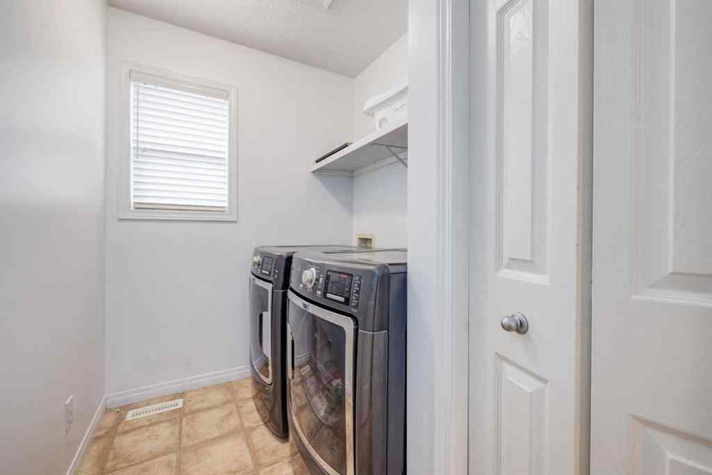 MLS® A2241696 - 61 Saddlecrest Place NE in Saddle Ridge Calgary, Residential
