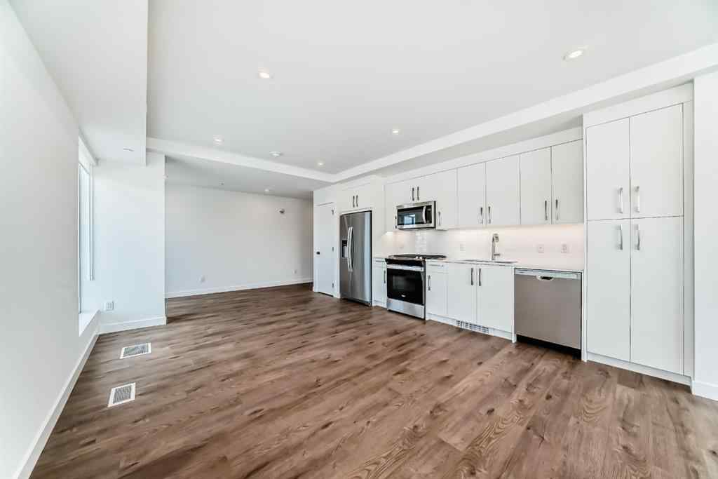 MLS® A2241700 - Unit #201 110 18A Street NW in West Hillhurst Calgary, Residential