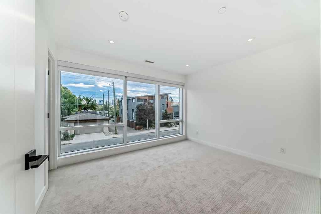 MLS® A2241700 - Unit #201 110 18A Street NW in West Hillhurst Calgary, Residential