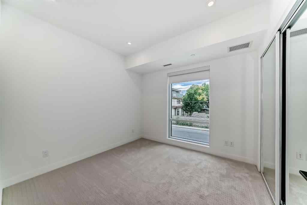 MLS® A2241700 - Unit #201 110 18A Street NW in West Hillhurst Calgary, Residential