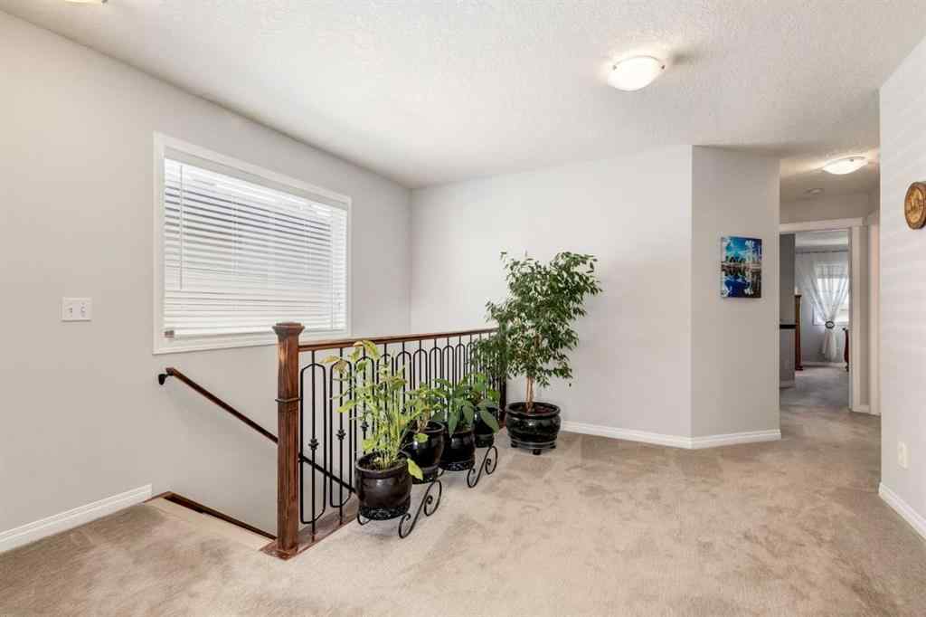 MLS® A2241720 - 163 Cougarstone Court SW in Cougar Ridge Calgary, Residential