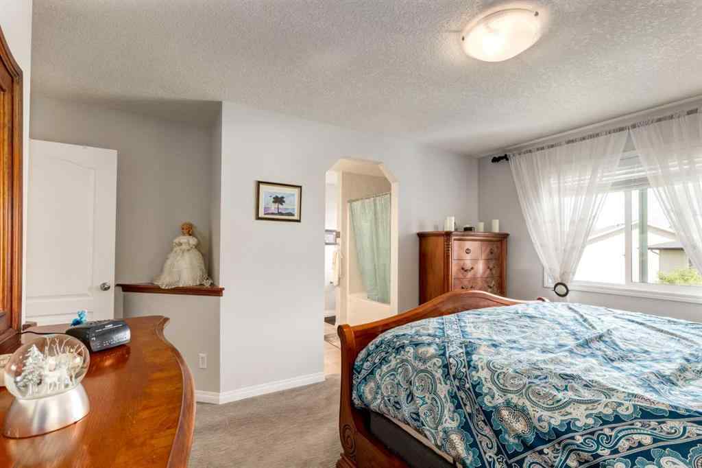 MLS® A2241720 - 163 Cougarstone Court SW in Cougar Ridge Calgary, Residential