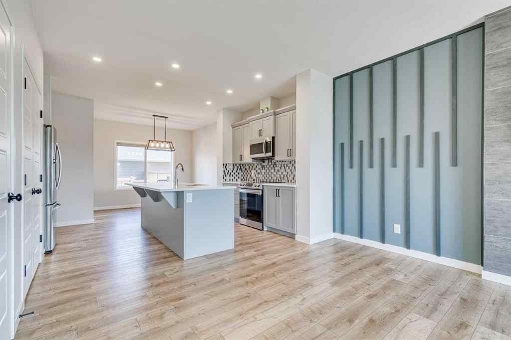 MLS® A2241724 - 452 Reynolds Avenue SW in Coopers Crossing Airdrie, Residential