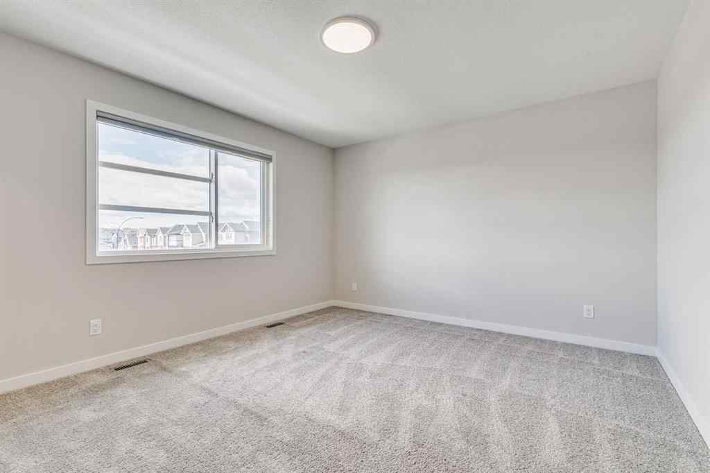 MLS® A2241724 - 452 Reynolds Avenue SW in Coopers Crossing Airdrie, Residential
