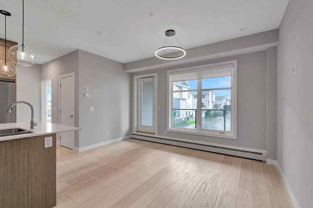 MLS® A2241732 - Unit #1214 681 Savanna Boulevard NE in Saddle Ridge Calgary, Residential