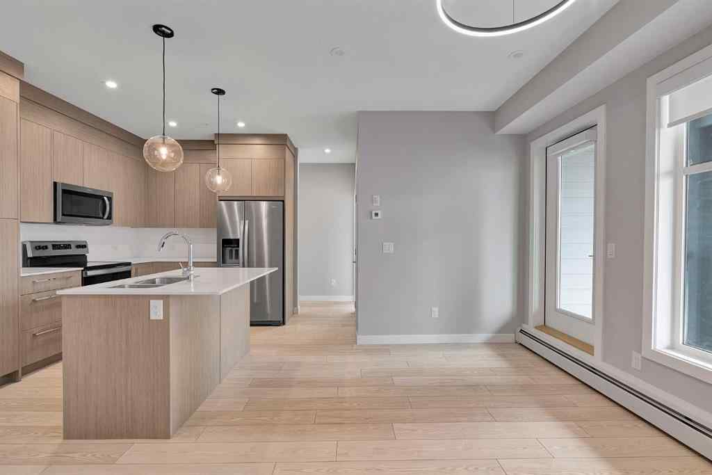 MLS® A2241732 - Unit #1214 681 Savanna Boulevard NE in Saddle Ridge Calgary, Residential