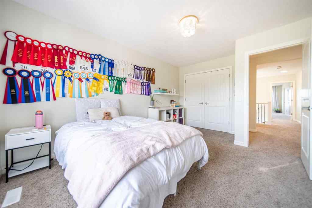 MLS® A2241821 - 27 Sunset Park  in Sunset Ridge Cochrane, Residential