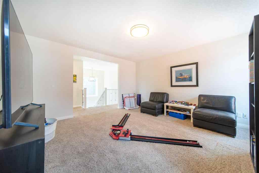 MLS® A2241821 - 27 Sunset Park  in Sunset Ridge Cochrane, Residential
