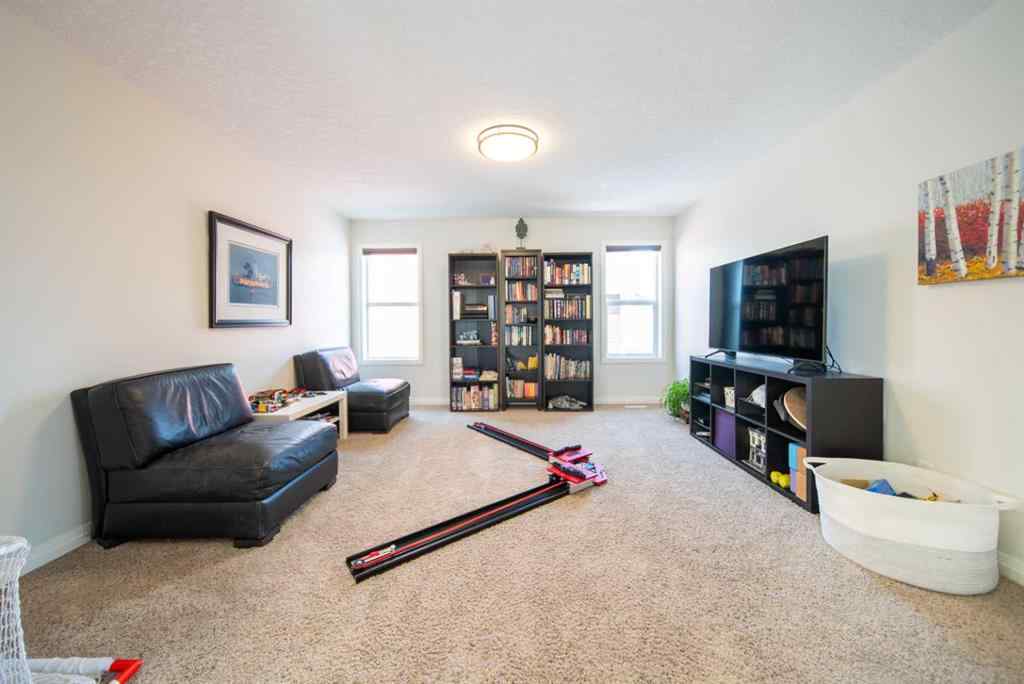 MLS® A2241821 - 27 Sunset Park  in Sunset Ridge Cochrane, Residential