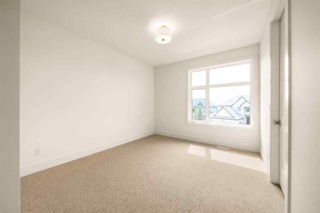 MLS® A2241917 - 42 RockCliff Heights NW in Rocky Ridge Calgary, Residential