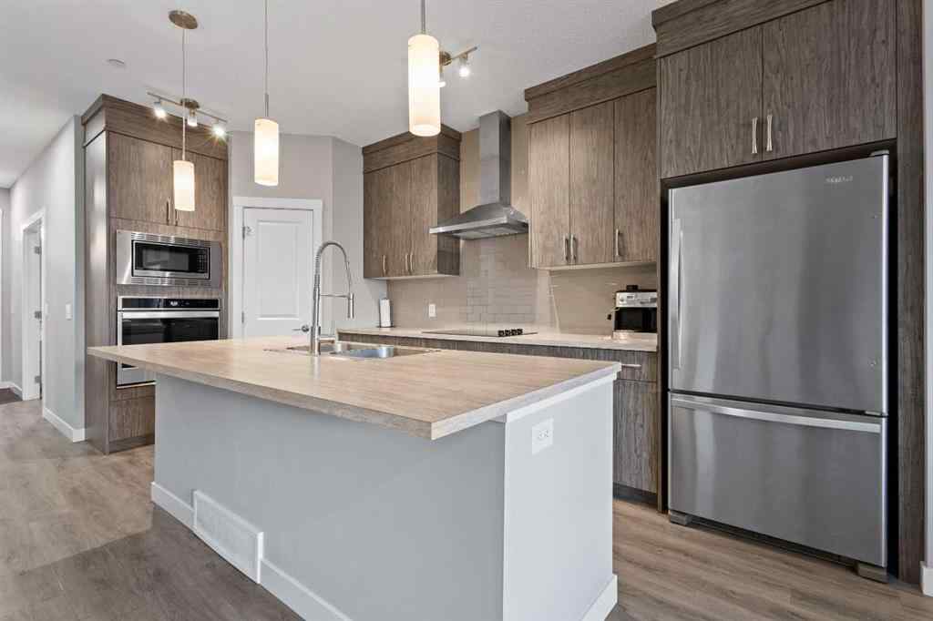 MLS® A2241942 - 75 Howse Crescent NE in Livingston Calgary, Residential