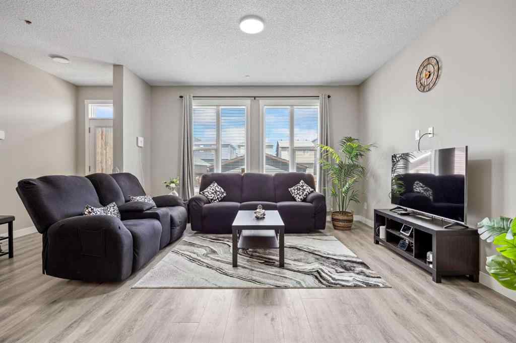 MLS® A2241942 - 75 Howse Crescent NE in Livingston Calgary, Residential