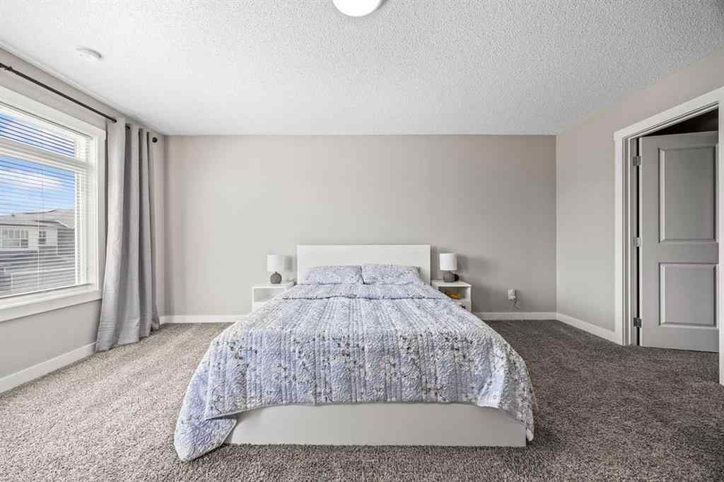 MLS® A2241942 - 75 Howse Crescent NE in Livingston Calgary, Residential