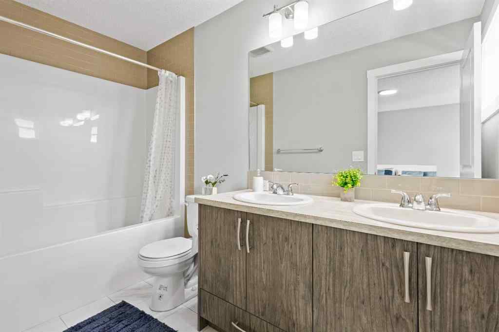 MLS® A2241942 - 75 Howse Crescent NE in Livingston Calgary, Residential
